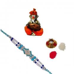 ECraftIndia Single Rakhi With Lord Ganesha Playing Dholak And Roli Tikka Matki Design Designer Rakhi